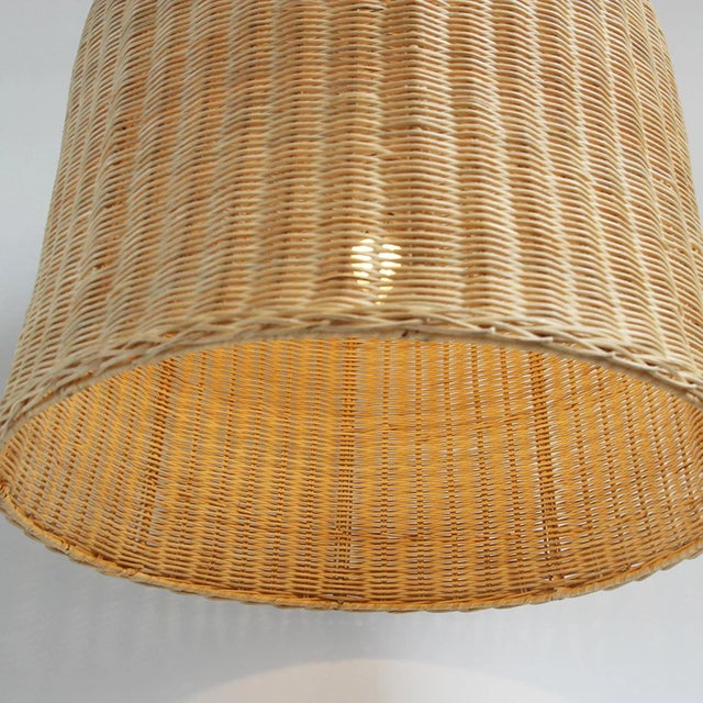 Classic and simple dome shaped wicker pendant lantern. Hand crafted natural raw wicker matte finish. Great texture and...