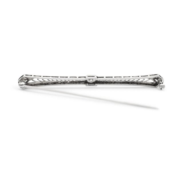 Metal Type: 14K White Gold and Platinum Length: 2.25 inches Width: 6.30 mm Weight: 3.39 grams Filigreed, 14K white gold...