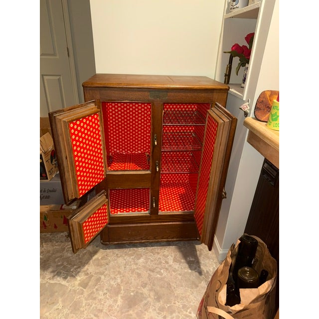 Antique Oak Ice Box manufactured by Northern Refrigerator Company of Grand Rapids under the label Glacier Furniture City...