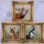 Striking set of three hand-painted porcelain animal plaques depicting a roaring stag, chamois, and antelope, each mounted...