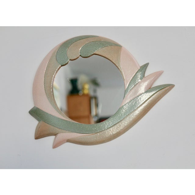 Ceramic mirror, 1970s, signed. One visible scratch. In very good condition.