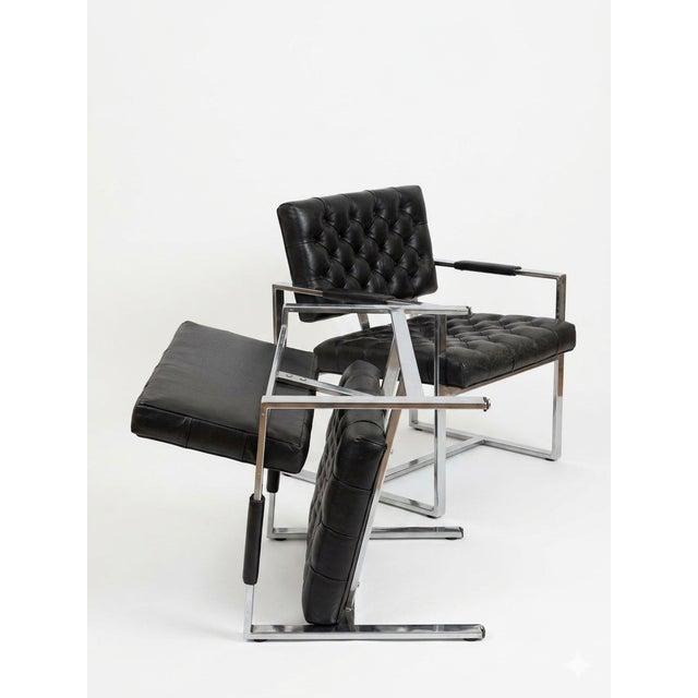 A spectacular matching pair of vintage mid-century modern lounge armchairs designed by Milo Baughman for Thayer Coggin,...