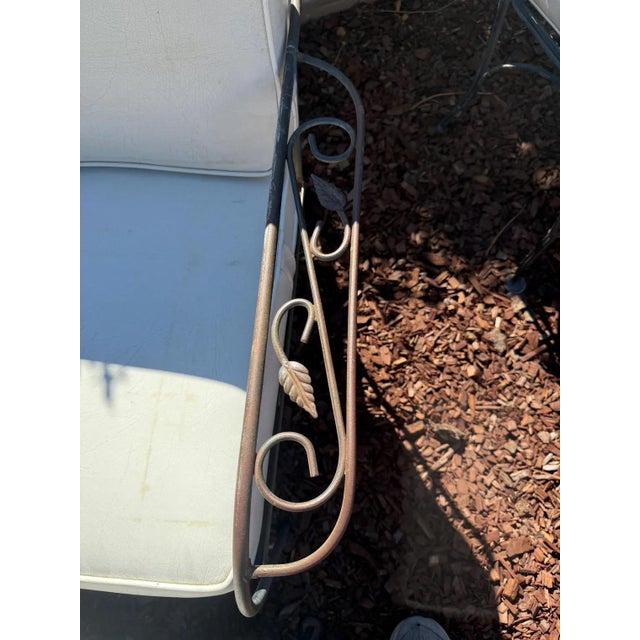 VINTAGE RUSSELL WOODARD attributed DEEP SEATING ARMCHAIR AND OTTOMAN ottoman has grape and leaves design and leaf design...