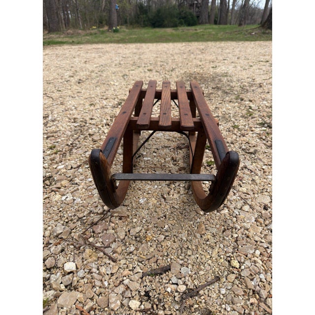 Very sweet vintage wooden Davos Sled. Made in Europe of sturdy wood and iron supports and runners. Size is 27.5' long x...
