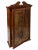 Vintage wooden wall cabinet with decorative glass door, broken arched pediment, dentil molding.