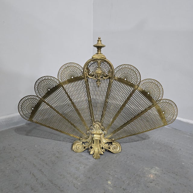 A very nice late 19th Century Victorian antique brass folding peacock fire screen. in very nice overall condition. You are...
