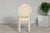 This vintage Louis XV-style side chair brings a graceful silhouette and delicate carved detail to any room. The frame...