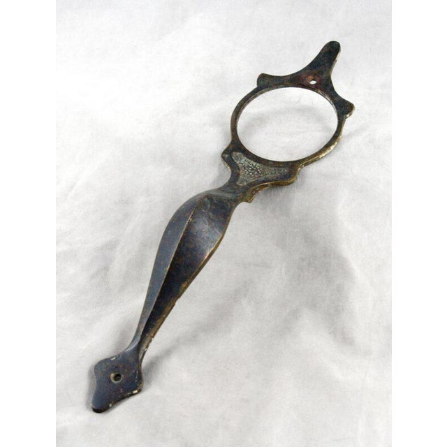 Arts & Crafts door pull with large lock insert. A lock is not included. The original mounting screws are not available....