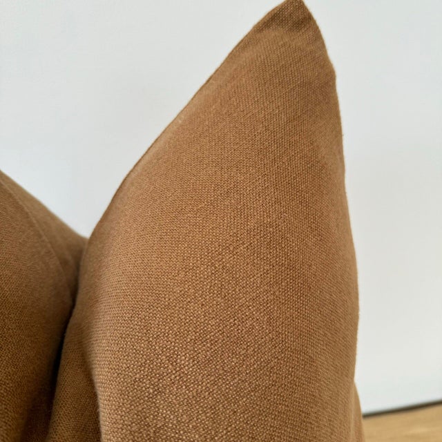 100% Belgian Linen. Stone washed, the color is Copper, a brown mixed tone. Cover Only. Machine washable, zipper closure...