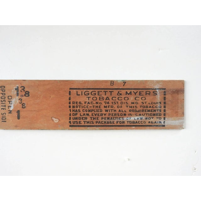 Oil on wood board folk art painting, wood is from an old tobacco crate. Circa 1915 river scene with ship flying American...