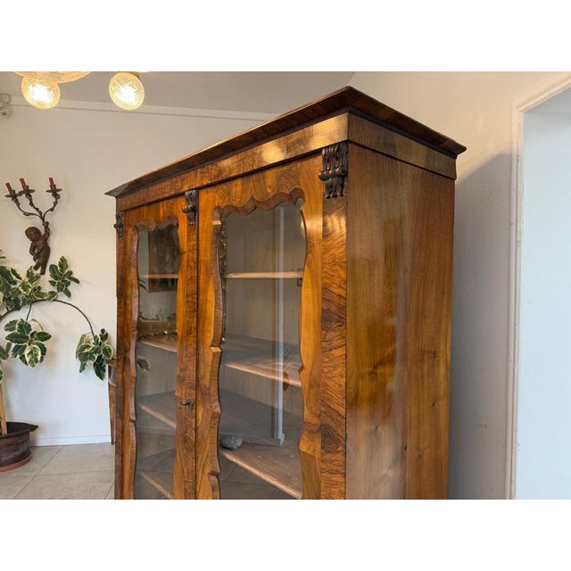 Antique Biedermeier Display Cabinet in Walnut. Dimensions: Height x Width x Depth 196 x 171 x 64 cm. Impressive original...