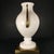 Primavera vase produced by venini, murano. White opaline glass body resting on a glass pedestal and a square chiseled...