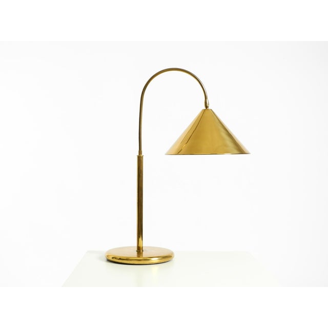Large, beautiful, original Mid-Century Modern brass table lamp with a conical shade. Lovely minimalist Mid-Century design...