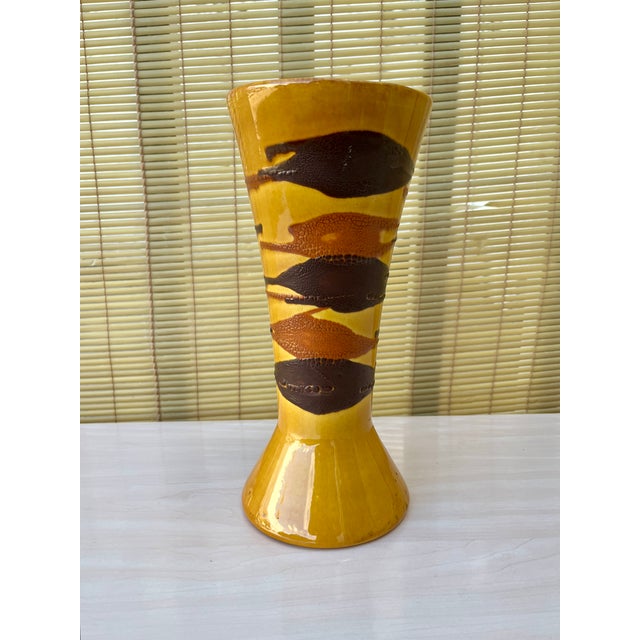 Vintage Mid Century Modern Earth Wrap Ceramic Vase by Royal Haeger Pottery. Circa 1960s. Features an hour-glass shape in...