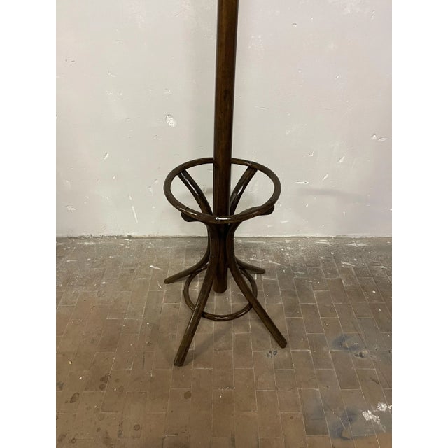 Clothes hanger with swivel hat holder and umbrella holder in the base, Produced in the end of the 1800s I have official...