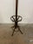Clothes hanger with swivel hat holder and umbrella holder in the base, Produced in the end of the 1800s I have official...