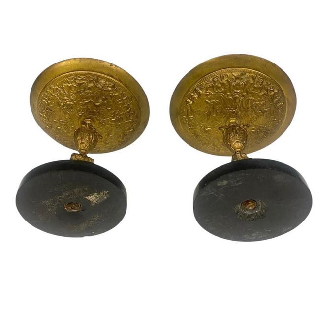 An impressive pair of French ormolu tazzas dating to circa 1880, executed in the Louis XVI manner The richly decorated...