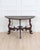 A striking 17th century chestnut console table, this antique piece showcases the bold craftsmanship and sculptural...