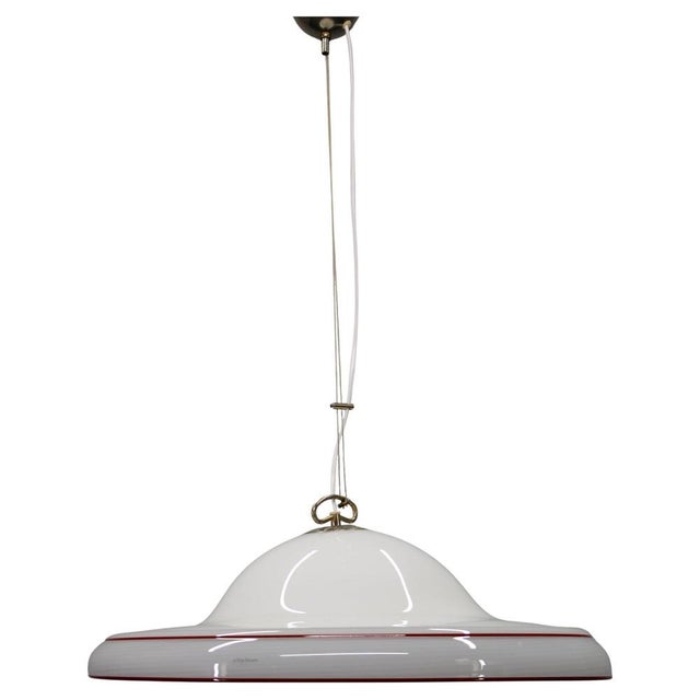 This authentic Murano glass pendant light was produced in Italy during the 1970s and represents the refined elegance of...