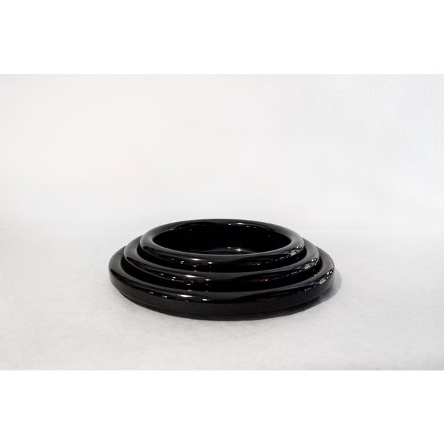 Centerpiece composed of three enameled sheet metal plates. Designer Gianfranco Frattini Manufacturer Progetti 1970s...