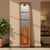 Dimensions: 18" W x 2" D x 71.5" H This vintage, bone inlaid door panel has been repurposed into a mirror wall art. The...
