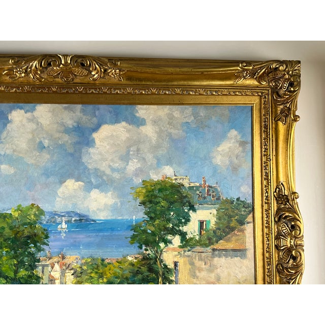This vintage oil on canvas captures a luminous summer coastal scene rendered in an Impressionist manner, with loose,...