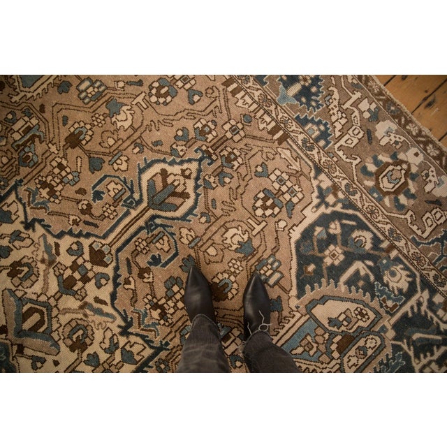 :: Oversize center medallion with concentric interior medallions in similar relief and starburst contour. Covered field of...