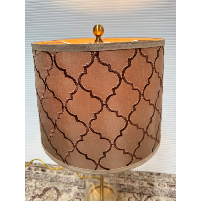 Design Plus Gallery presents the Payton Table Lamp from Ralph Lauren. The table lamp has golden brass hardware that is...