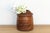 This Indus Grain Vessel is a soulful study in organic geometry. Hand-turned from a single, solid block of seasoned Teak...