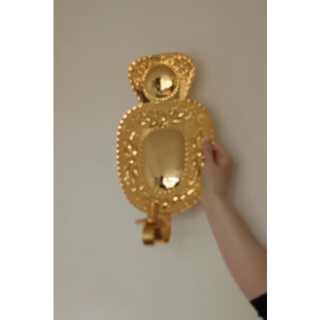 Stunning pair of Swedish brass sconces, featuring beautiful detailing. Both sconces are in very good vintage condition...