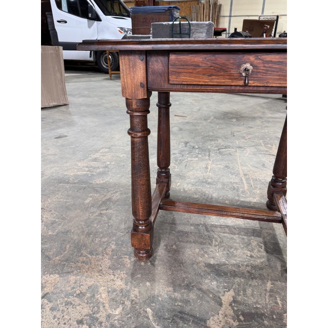 This is an excellent example of English craftsman ship. This 19th century, English side table features a single drawer,...