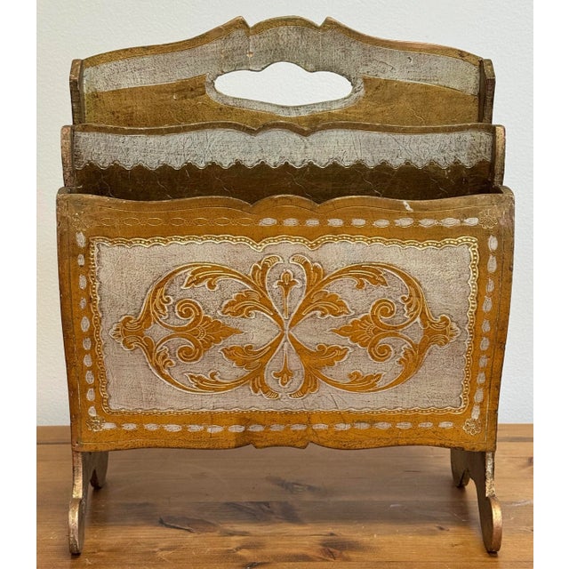 Vintage Mid-century Italian Florentine magazine rack painted distressed cream and embossed gold gilt in the traditional...