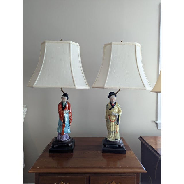 Pair of Chinese figure lamps. This is two Chinese Famille Rose Porcelain figures that have been made into beautiful lamps...
