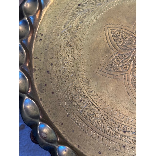 Brass 1960s Small Moroccan Engraved Brass Tray With Scalloped Top on Carved Stand For Sale - Image 8 of 8