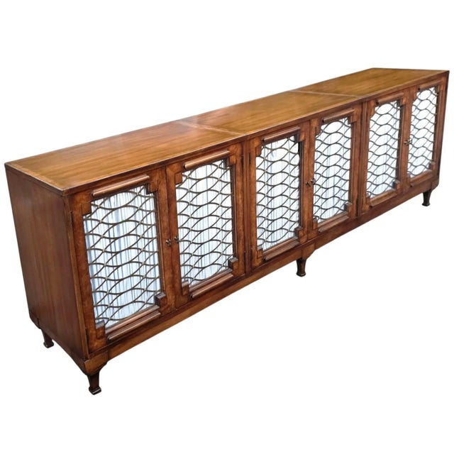 This Vintage French Empire-Style Cherry Credenza with Six Lattice Doors is gorgeous, featuring beautifully detailed...