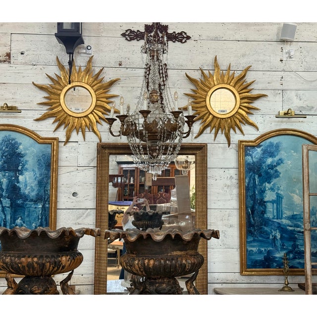 Italian Florentine sunburst mirrors, each spanning an impressive 37 inches in diameter. Hand-carved and gilded in warm...