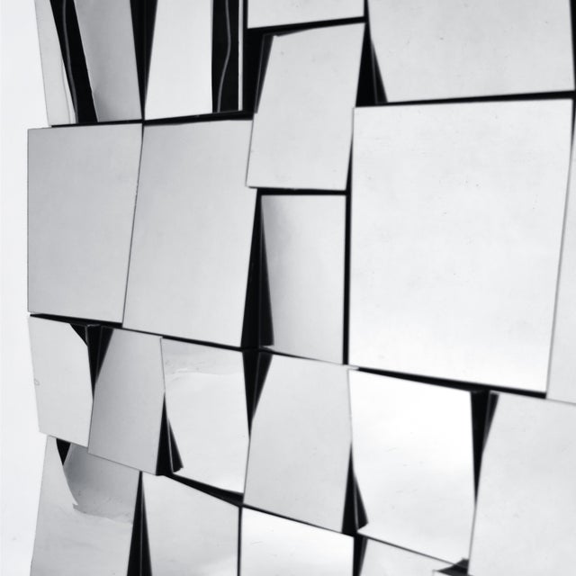 A wonderful vintage example, this arresting wall mirror/sculpture engages the viewer and activates any wall with its...