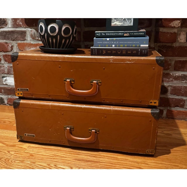 Set of two vintage mid-century salesman sample cases by Fibre Products Mfg. Co. (New York), featuring rich brown...