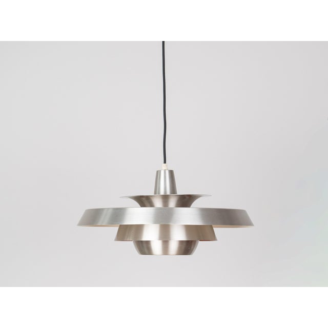 This beautiful aluminum pendant lamp was designed in the 1980s by Danish designer **David Mogensen** for the Danish...