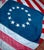 Real Vintage Betsy Ross American Revolutionary Flag 13 Stars Cotton 1976 With Beautiful Naturally Faded Patina and Wear. 3x5 For Sale - Image 4 of 8
