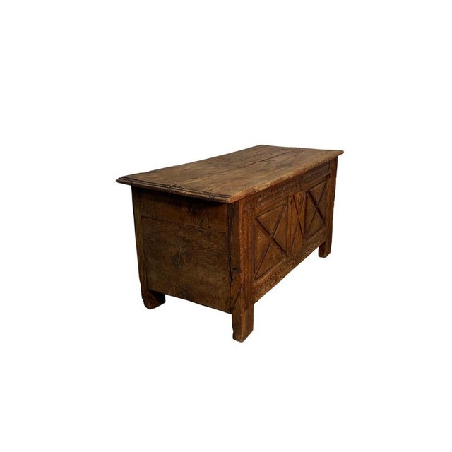 Antique oak chest dating back to the 19th century, featuring a solid structure and a richly articulated front with...