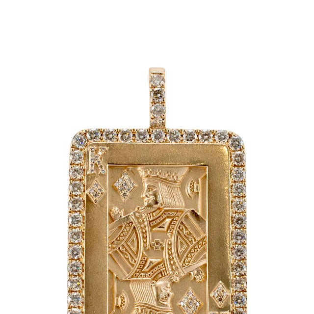 Gender: Men’s Metal Type: 14K Yellow Gold Length: 2.00 inches Width: 1.00 inches Weight: 19.98 grams Men's 14K yellow gold...