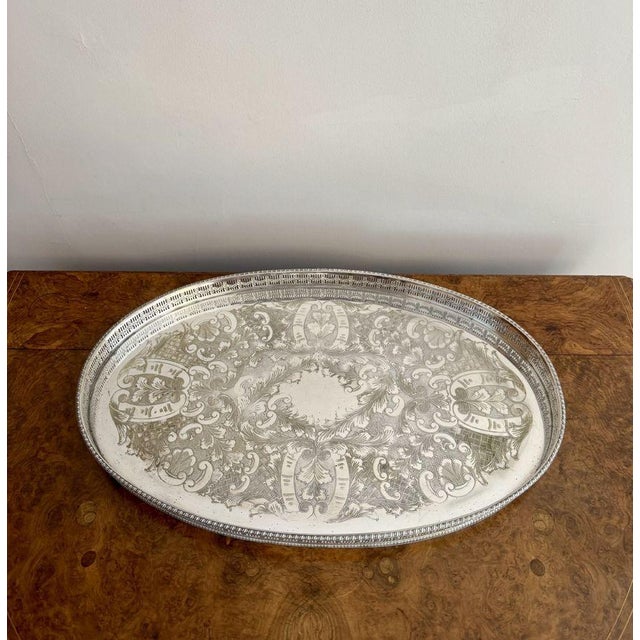 Quality antique Edwardian silver plated tray, having a quality antique Edwardian silver plated oval shaped tray with...