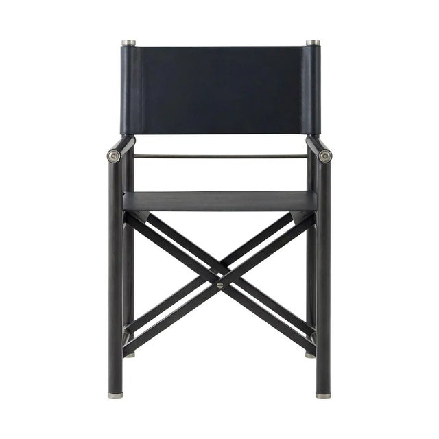 This chair features a sophisticated black leather backrest and seat, paired with a rich wooden beech frame and elegant...