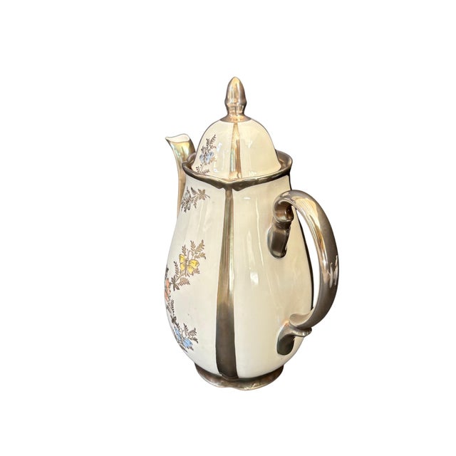 This vintage Rudolf Wachter (RW) Bavaria porcelain coffee service features fine silver-plated trim (Dekor Feinsilber) and...