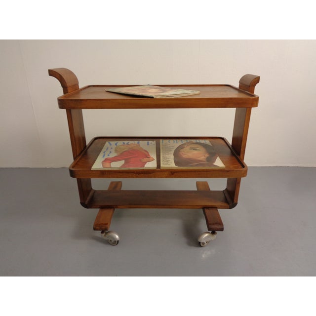 Rollable tea trolley or serving trolley in beech from the 1930s.