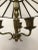 This chandelier in glass and bronze is from around 1920-1930. European Plug (up to 250V).The wiring of this item may be...