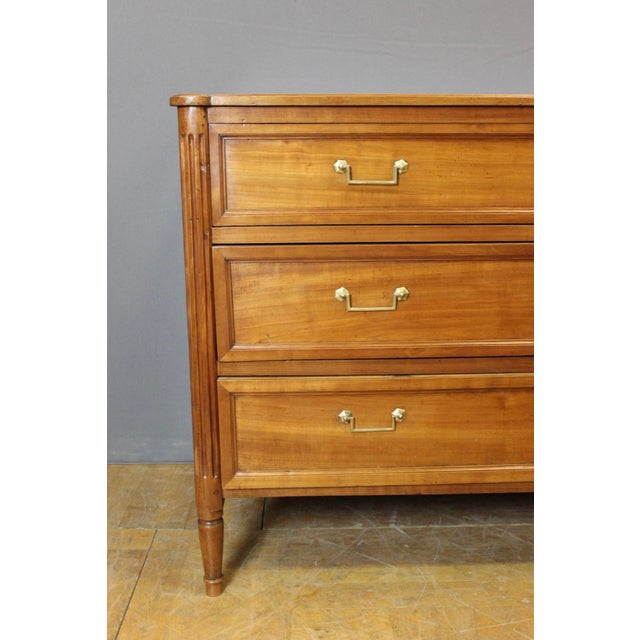 Louis XVI style cherrywood commode, opening with three drawers, original solid cherrywood top, original bronze mounts, two...