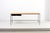 Paul McCobb console table in metal with glass top. This piece is attributed to the mentioned designer/maker. It has no...