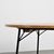 Table model 302, designed by Alain Richard in the mid-1950s and produced by Meubles TV in France. The circular ash top...